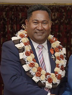Saimoni Lealea pictured receiving Honorary MNZM, for services to Pacific communities